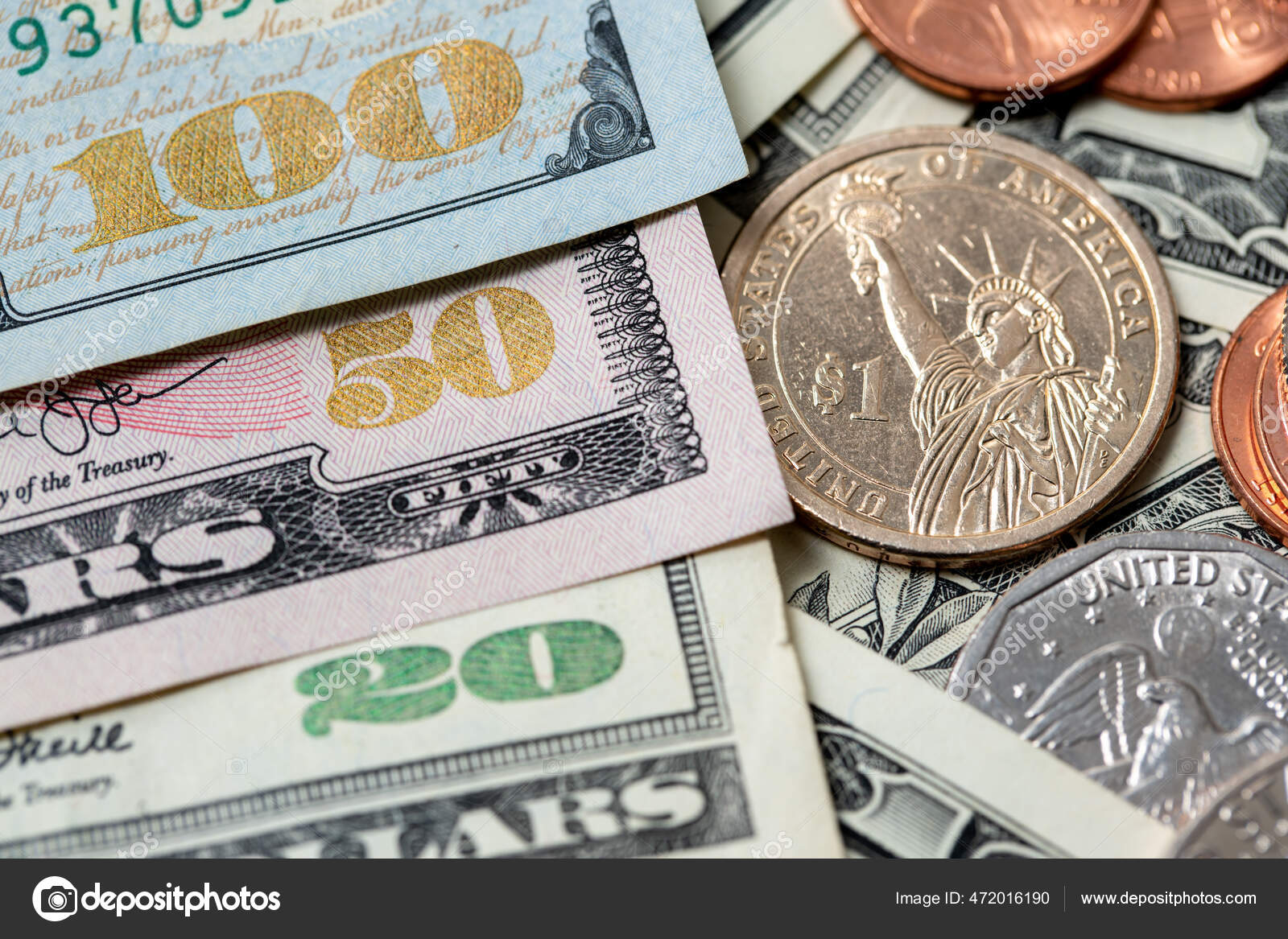 面值为20至100美元的美元钞票1美元硬币旁边的钞票1美元硬币——图库图片© P.Rabanser #472016190