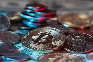 Bitcoin in front of piled up US dollar coins. Crypto currency Technology