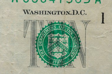 On dolarlık banknotlar. 10 Amerikan Doları 'nın kapanışı. Para arka planda. Banknotta on tane yazı
