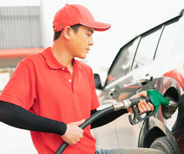 Asian Gas Station Worker Man Holding Green Fuel Nozzle Two — Foto de Stock
