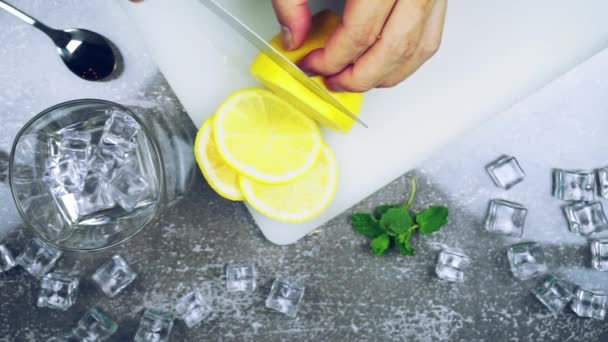 Top View Man Cut Fresh Lemon Cutting Board Ice Glass — Stock Video