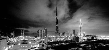 Dubai, gökdelenler, simgeler, yüz manzaralı Burj Halife, şehir silüeti, sahil kenarı, palmiye ağaçları.,