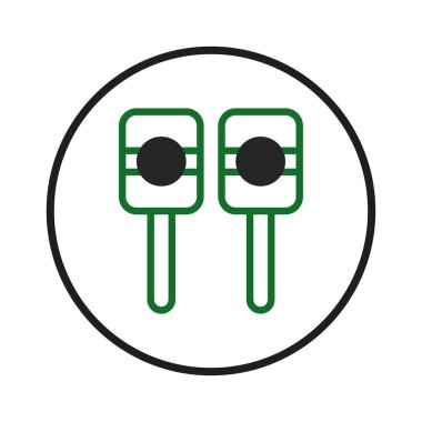 Grafik çiziminde dairesel bir kenar içinde bir çift yeşil ve siyah marakas sergileniyor. Perküsyon enstrümanları, festival ortamlarını temsil etmek için mükemmel bir müzikal tema öneriyor.,