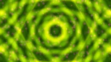 Parlayan turuncu eşmerkezli daireler ve pembe bokeh ışıkları ile soyut bir arka plan büyüleyici bir görsel efekt yaratır..