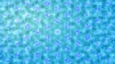 Vibrant abstract background with blurred green and teal bokeh lights creating a mesmerizing kaleidoscope pattern.