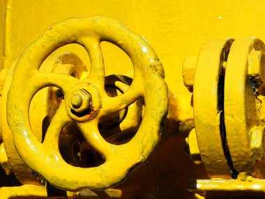 Yunanistan 'daki eski, sarı bir makine parçasının soyut ayrıntıları