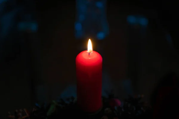 Advent candles glow and mark the celebration of Christmas/Advent Wreath