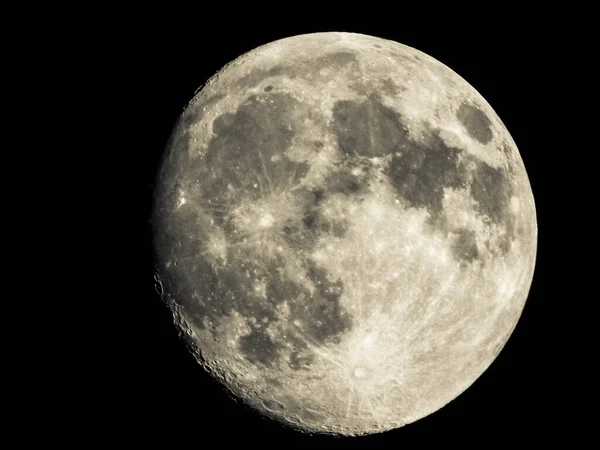 Earth\'s Moon Glowing On Black Background