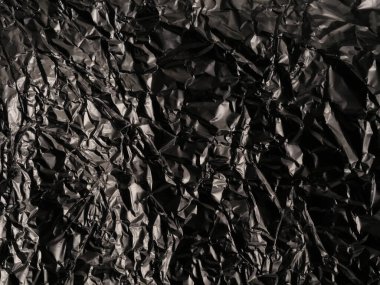 Parlak, düz olmayan yüzeyi olan gümüş yapraklı ince bir zemin.