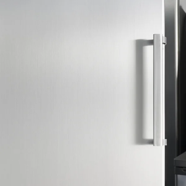 Silver fridge door with handle, with free space for text — Stock Photo, Image