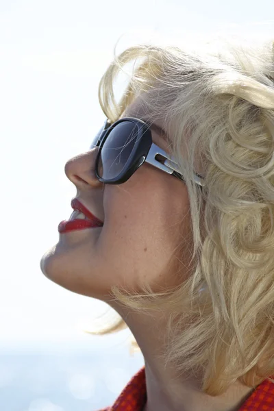 Stunning blonde haired teenage girl at the beach — Stock Photo, Image