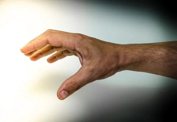 Menschliche Hand von der Finsternis zum Licht — Stockfoto