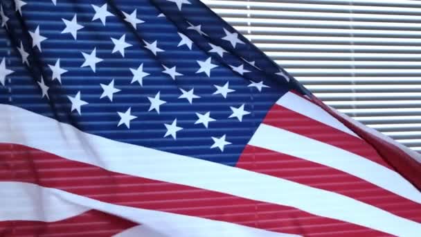 American Flag Sways Wind Background Window Covered Blinds Stars Stripes — Stock Video