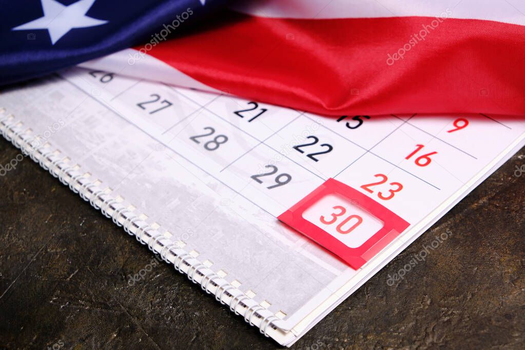 Flag United States America with calendar marked on thirtieth day Memorial Day