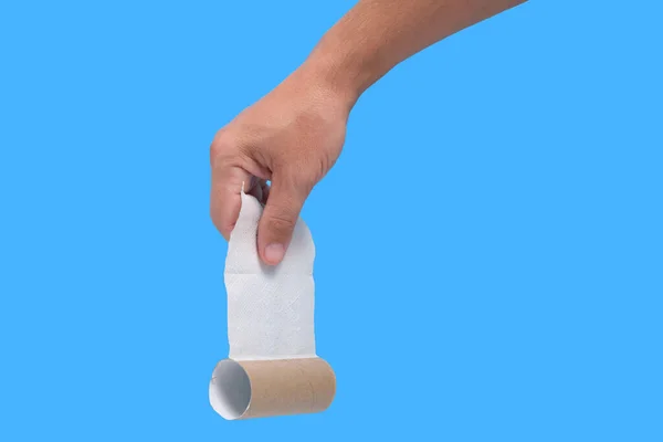Rolo Usado Papel Higiênico Sua Mão Sobre Fundo Azul — Fotografia de Stock