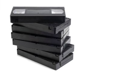 Stack of VHS video cassettes isolated on white background