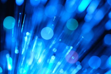 Fiber optik arka planda bir sürü ışık noktası ve bokeh