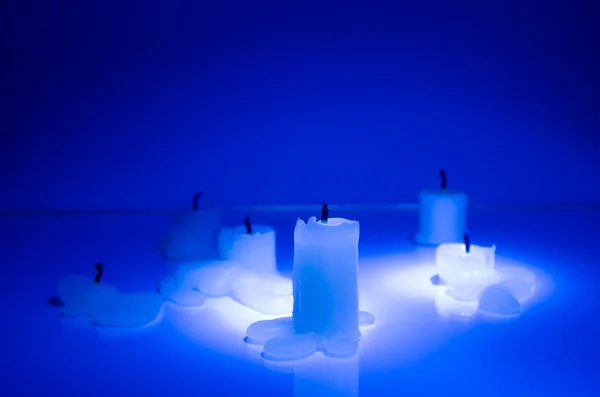 Extinguished candles in blue — Stock Photo, Image