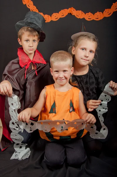 The boys and girl wearing halloween costumes — Stock Photo, Image