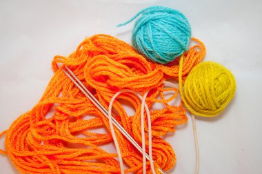 Wool and knitting needles. knit work