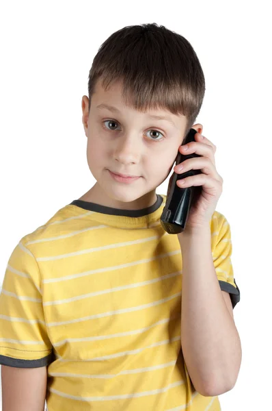 Симпатичный мальчик с телефоном в руках — стоковое фото