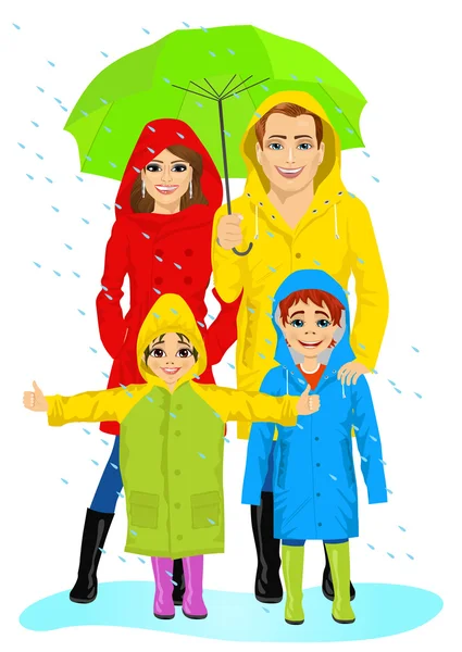 Happy familt in raincoats standing with umbrella — Stock Vector