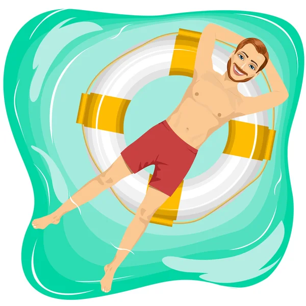 Hombre guapo flotando en un círculo inflable en la piscina — Vector de stock