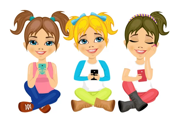 Tres niñas lindas sentadas en el suelo usando sus teléfonos inteligentes sonriendo feliz — Vector de stock