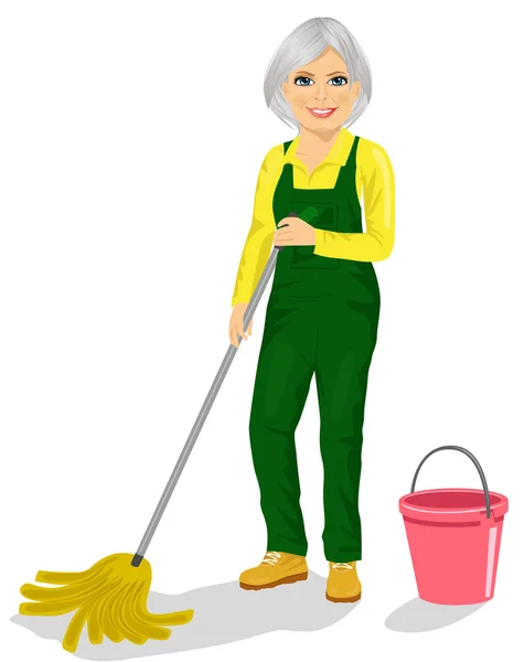 Senior woman with pink bucket and mop — Stock Vector