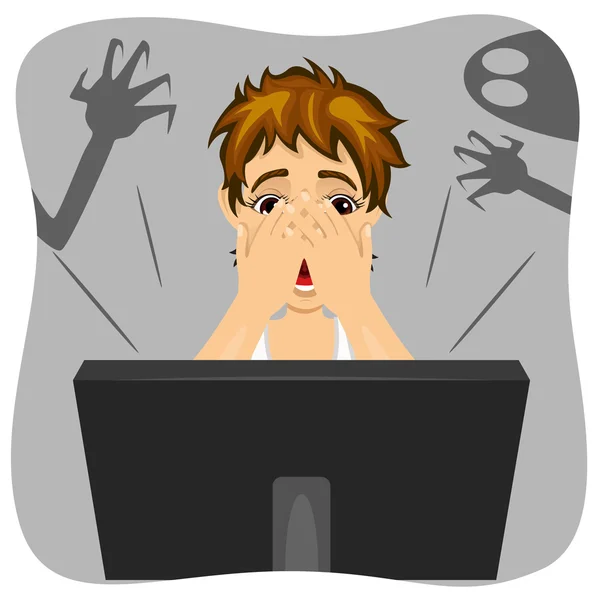 Jongen die betrekking hebben op zijn gezicht tijdens het kijken naar horrorfilm op internet. Schaduw van geest is op muur — Stockvector