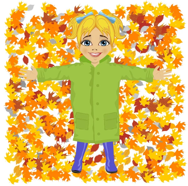 Cute little girl wearing green raincoat lying on colorful autumn leaves in park — Stock Vector