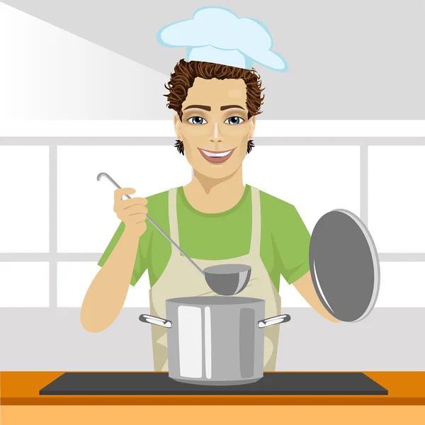 戴上帽子，在炉子做饭的围裙的年轻厨师 — 图库矢量图片