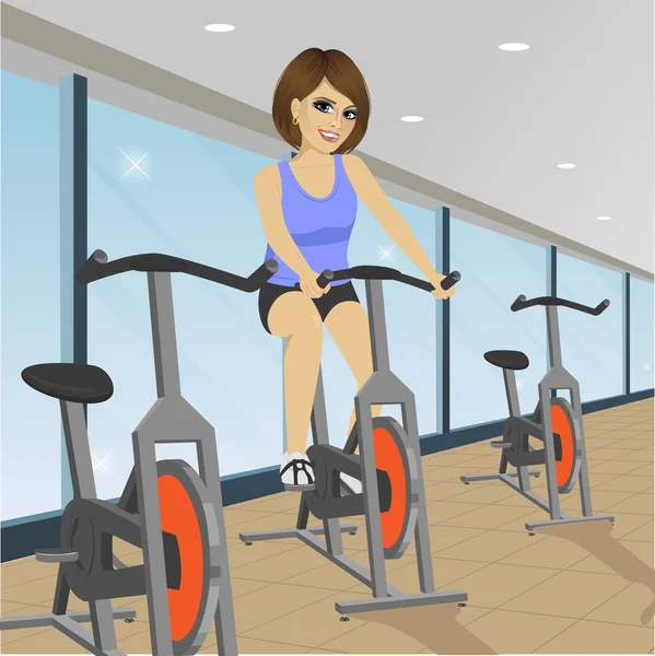 Genç kadının spor salonunda kapalı bisiklet egzersiz yapması — Stok Vektör