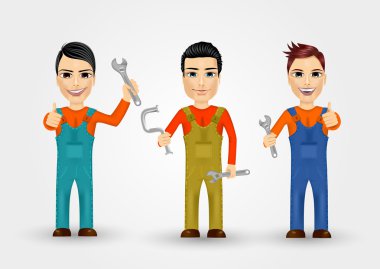 iş elbiseleri giymiş üç genç su tesisatçıları