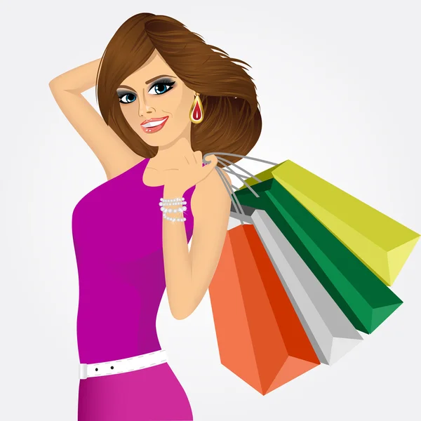 Sonriente joven con bolsas de compras — Vector de stock