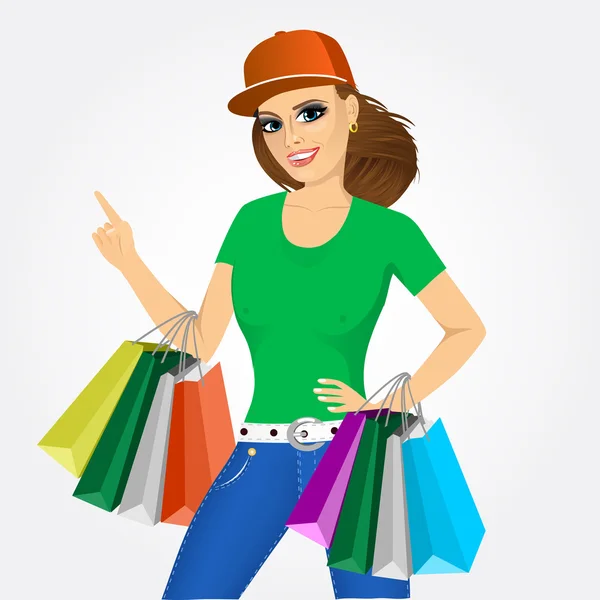 Mujer sosteniendo bolsas de compras — Vector de stock