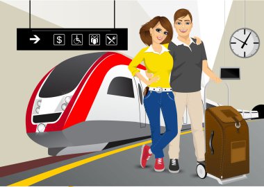 mutlu çift ayakta tren istasyonunda