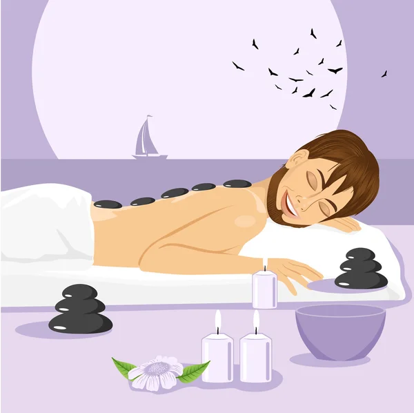 Man having stone massage in a spa — Stockvector