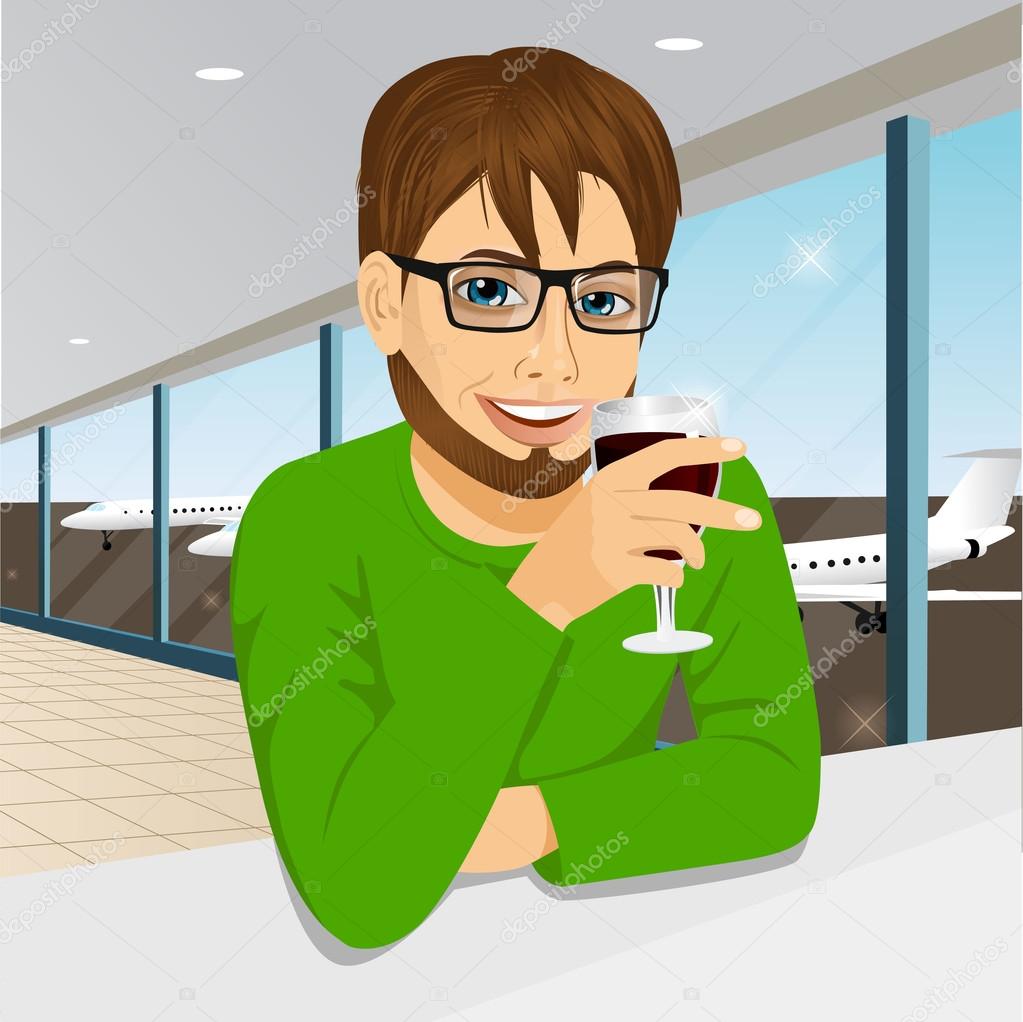 handsome man with glasses drinking wine