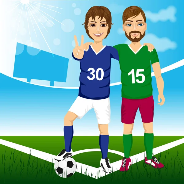 Двое молодых друзей футболистов — стоковый вектор