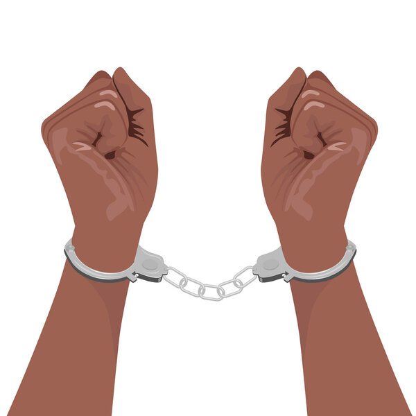 pair of african american hands in handcuffs