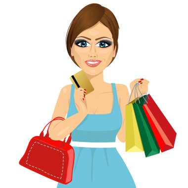 Young woman with shopping bags, handbag and credit card on a white background