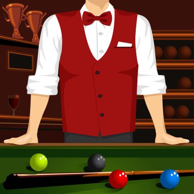 adam bir bilardo masası cue stick ve renkli bilardo topları ile eğilerek