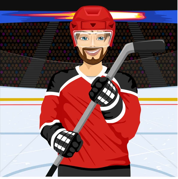 Хоккеист с хоккейной клюшкой — стоковый вектор
