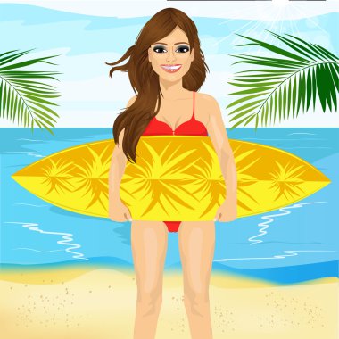 profesyonel kadın sörfçü bir sörf tahtası holding