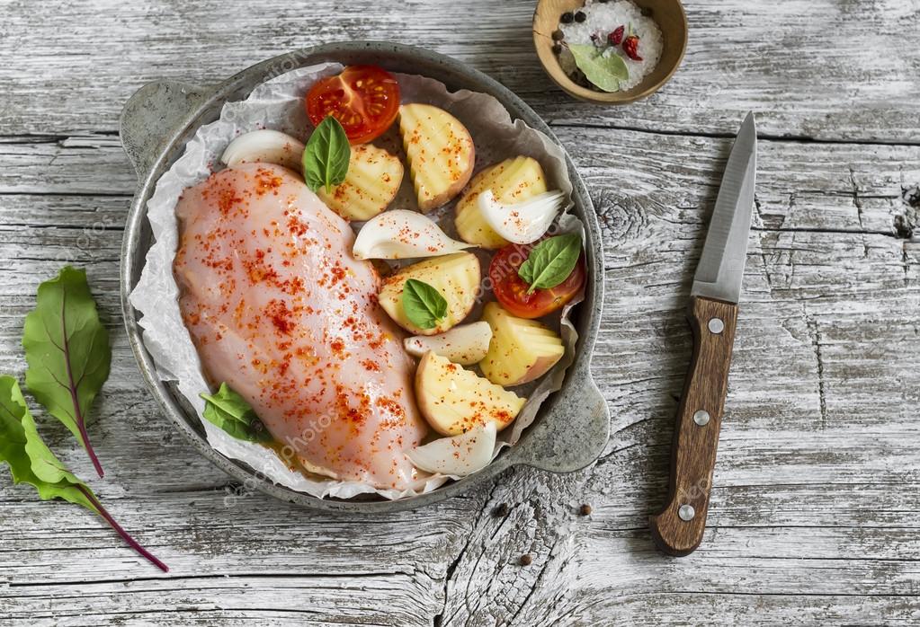 Chicken Breast Potatoes Onions Tomatoes Raw Ingredients For Making chicken-breast-potatoes-onions-tomatoes-raw-ingredients-for-making