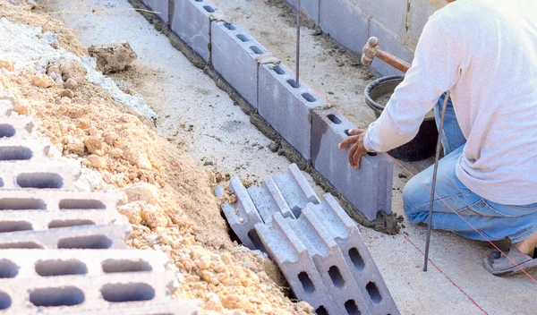 Workers are laying blocks of bricks, Construction work