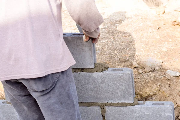 Workers are laying blocks of bricks, Construction work