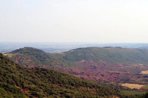 mountain range with red earth