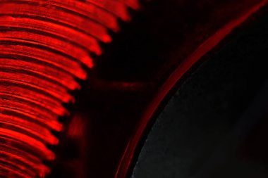 Soyut makro fotoğrafçılık. Kırmızı yuvarlak cam lamba dokusu